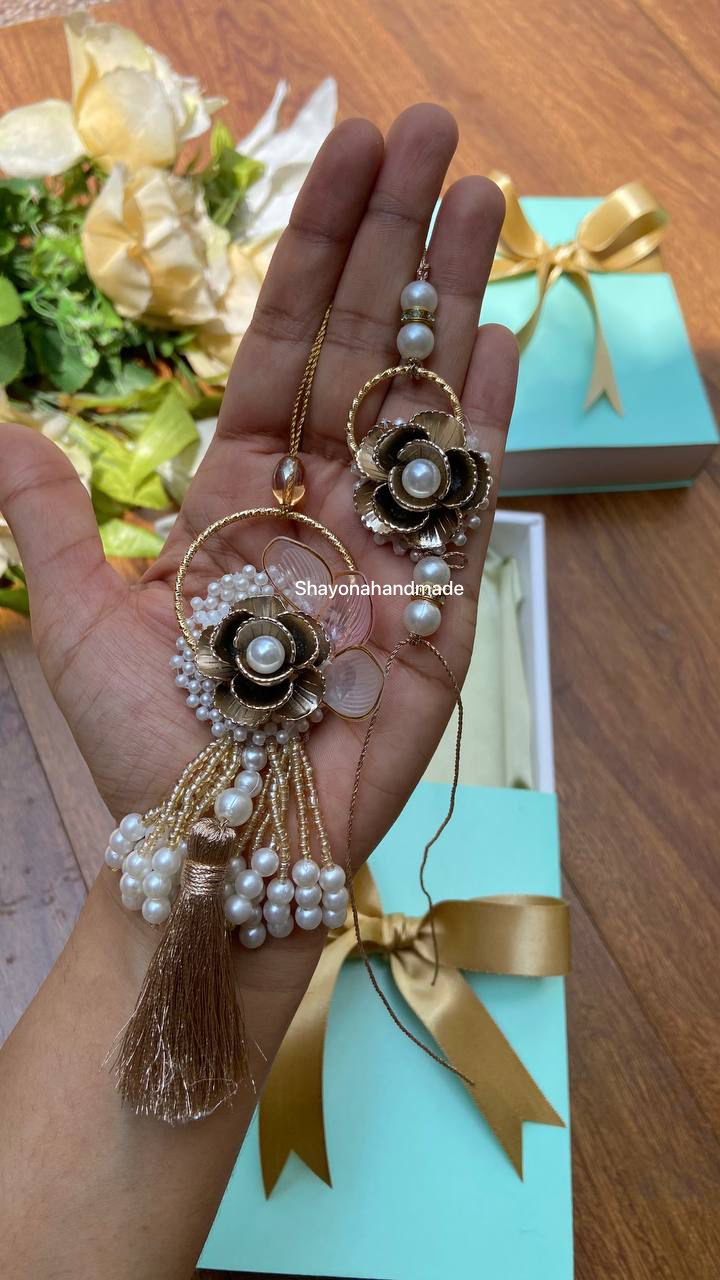 Tanmaya – Bronze Bloom Rakhi Pair