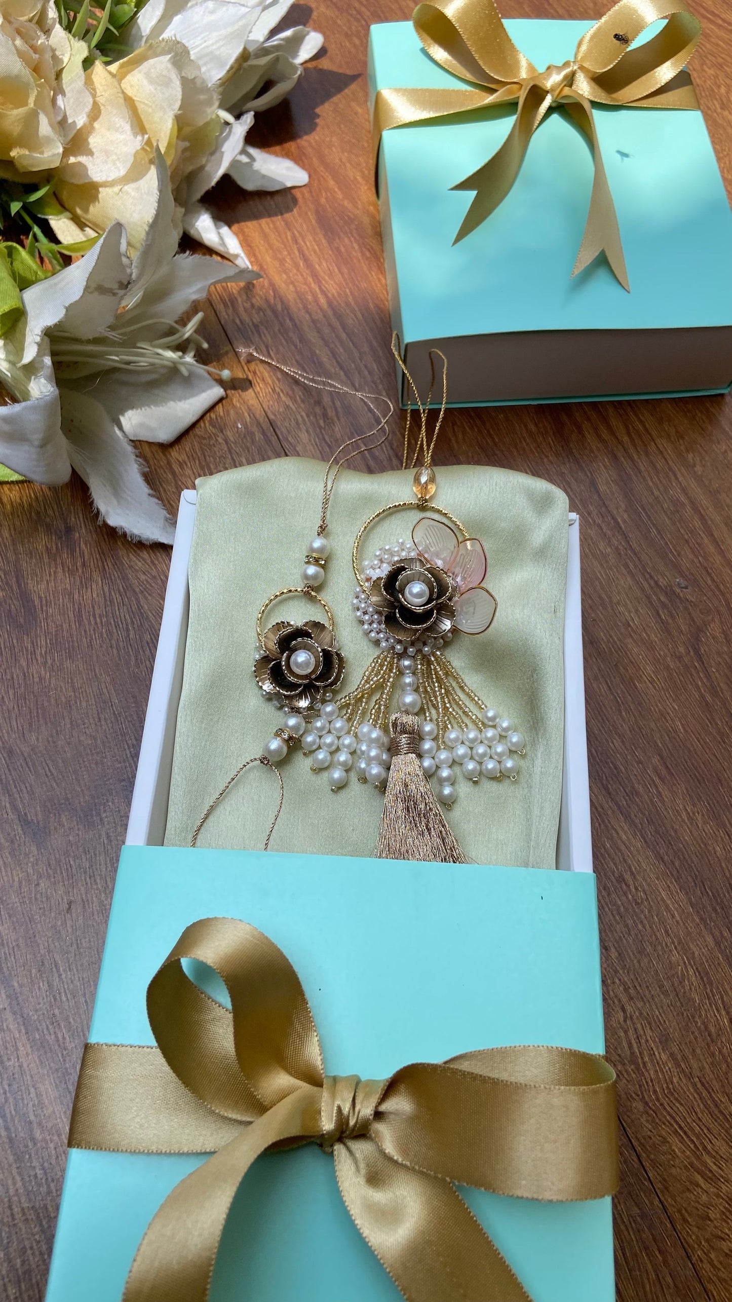 Tanmaya – Bronze Bloom Rakhi Pair